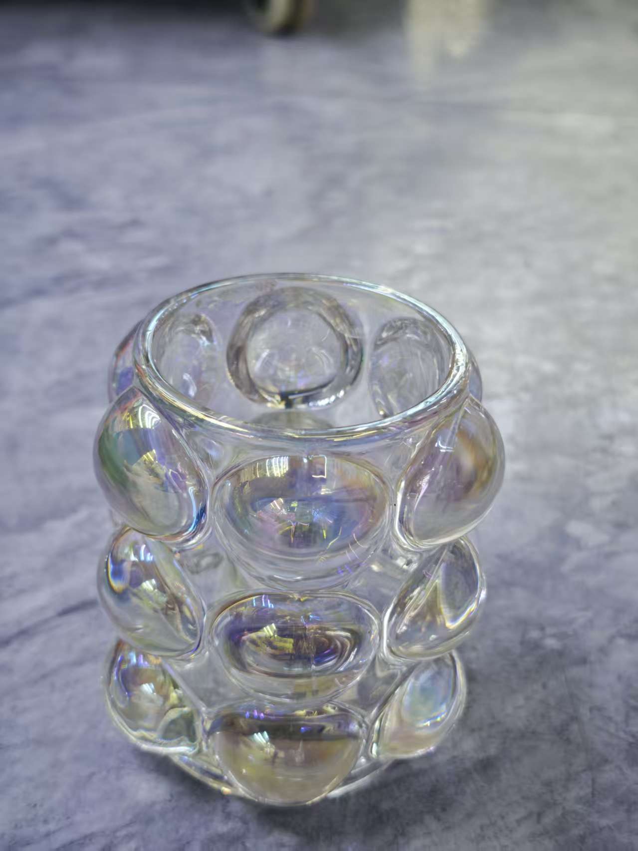 The transparent water cup is surrounded by colored glass balls Application Scenario