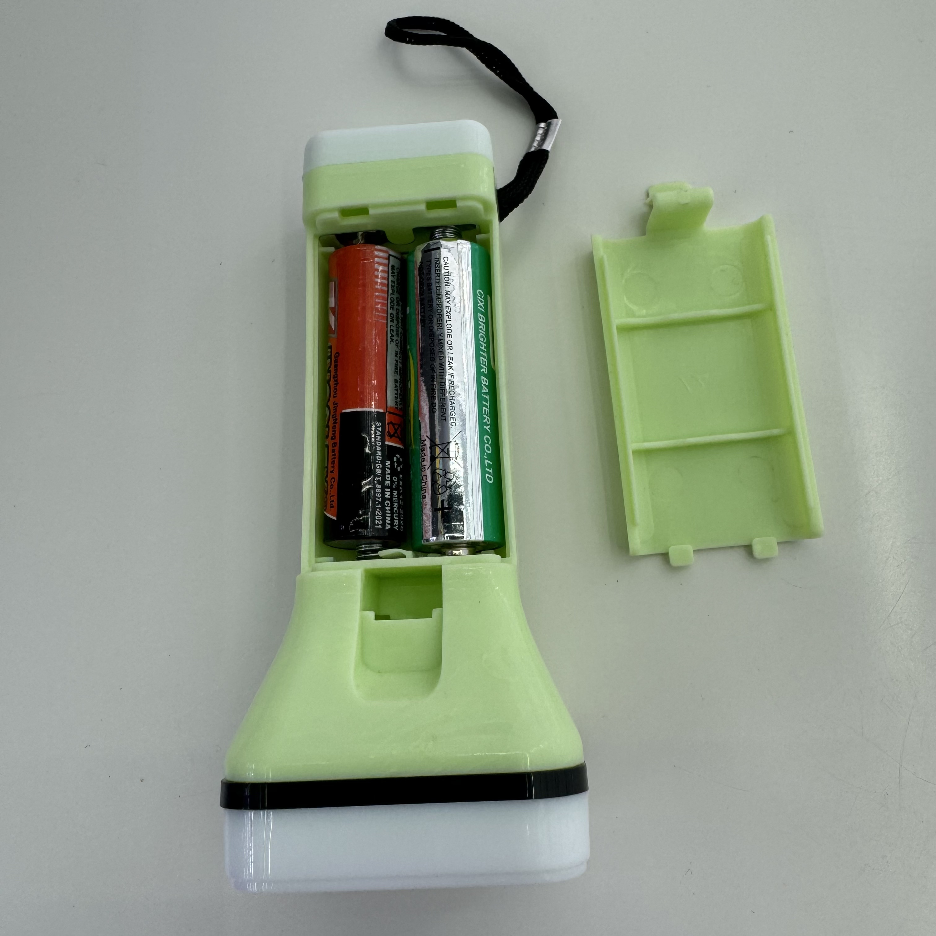 The green flashlight body is shockproof and durable for strong outdoor lighting Item Picture
