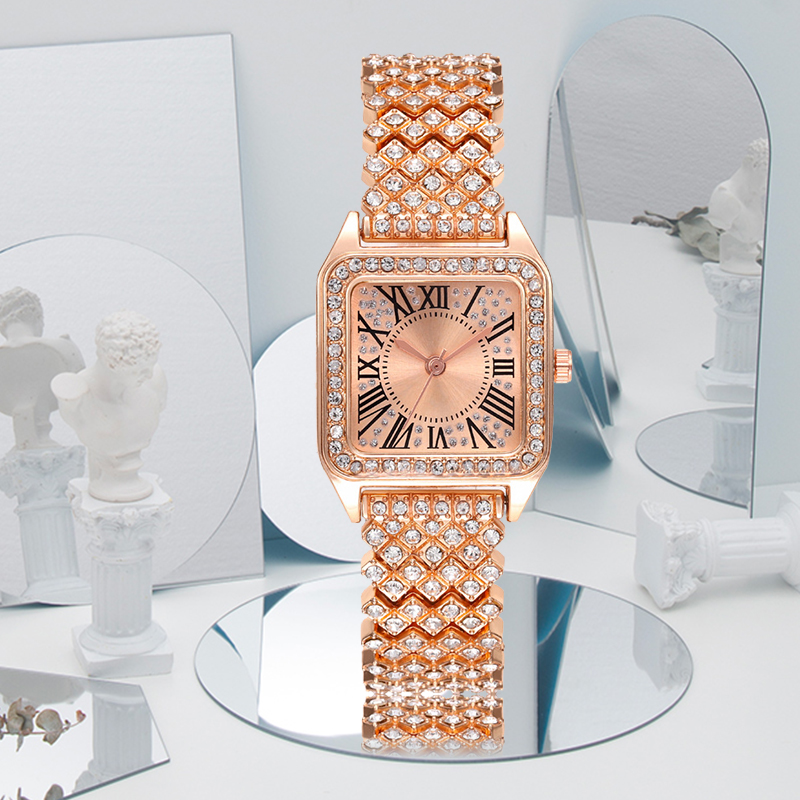 This rose gold diamond-encrusted square ladies' watch features a classic, fashionable and simple design
