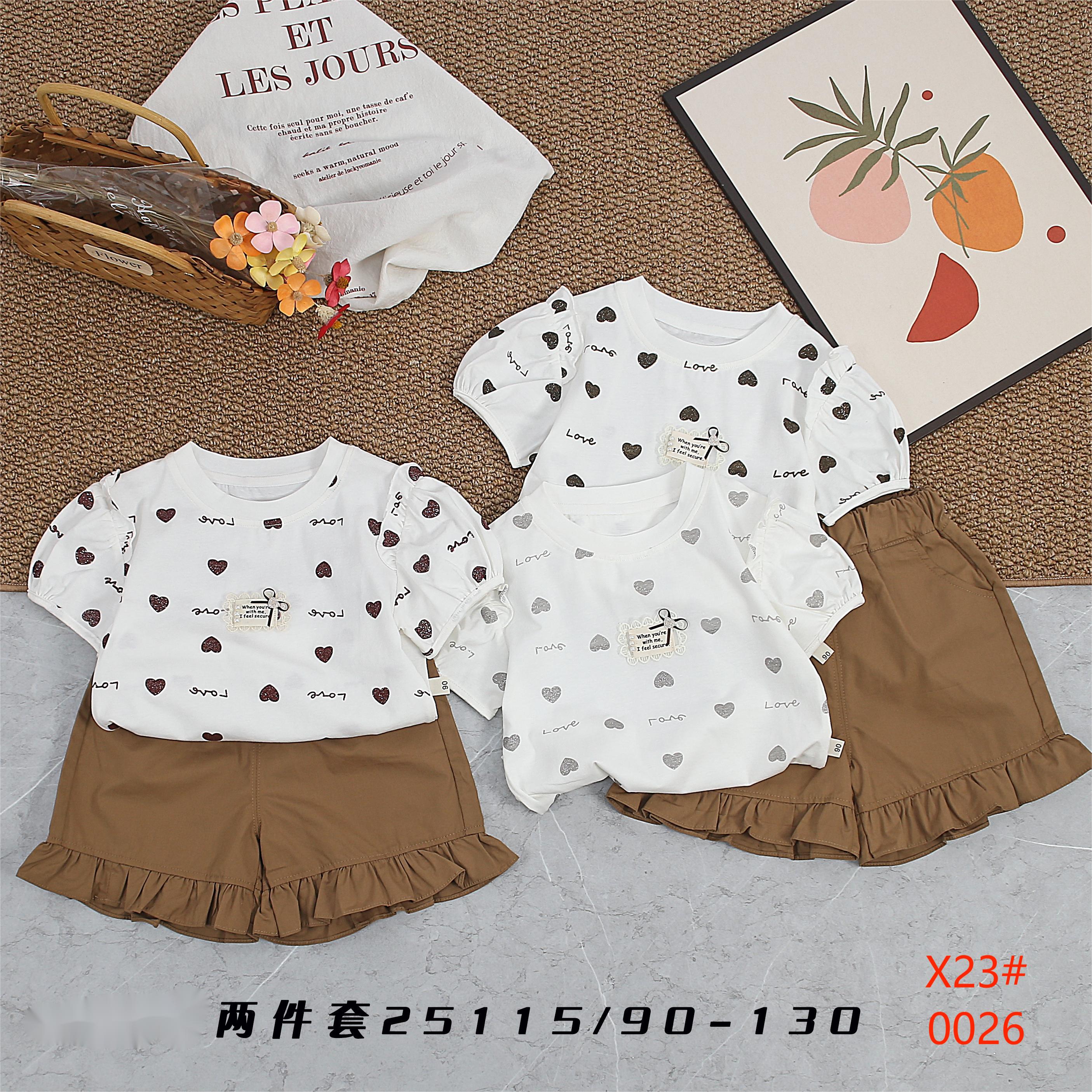 Two little girls in a lace top and shorts children's clothing set are sweet and cute details Picture