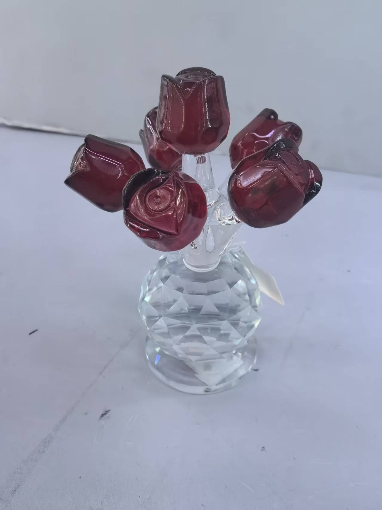 A romantic bouquet of glass roses and a glass vase for your girlfriend's birthday