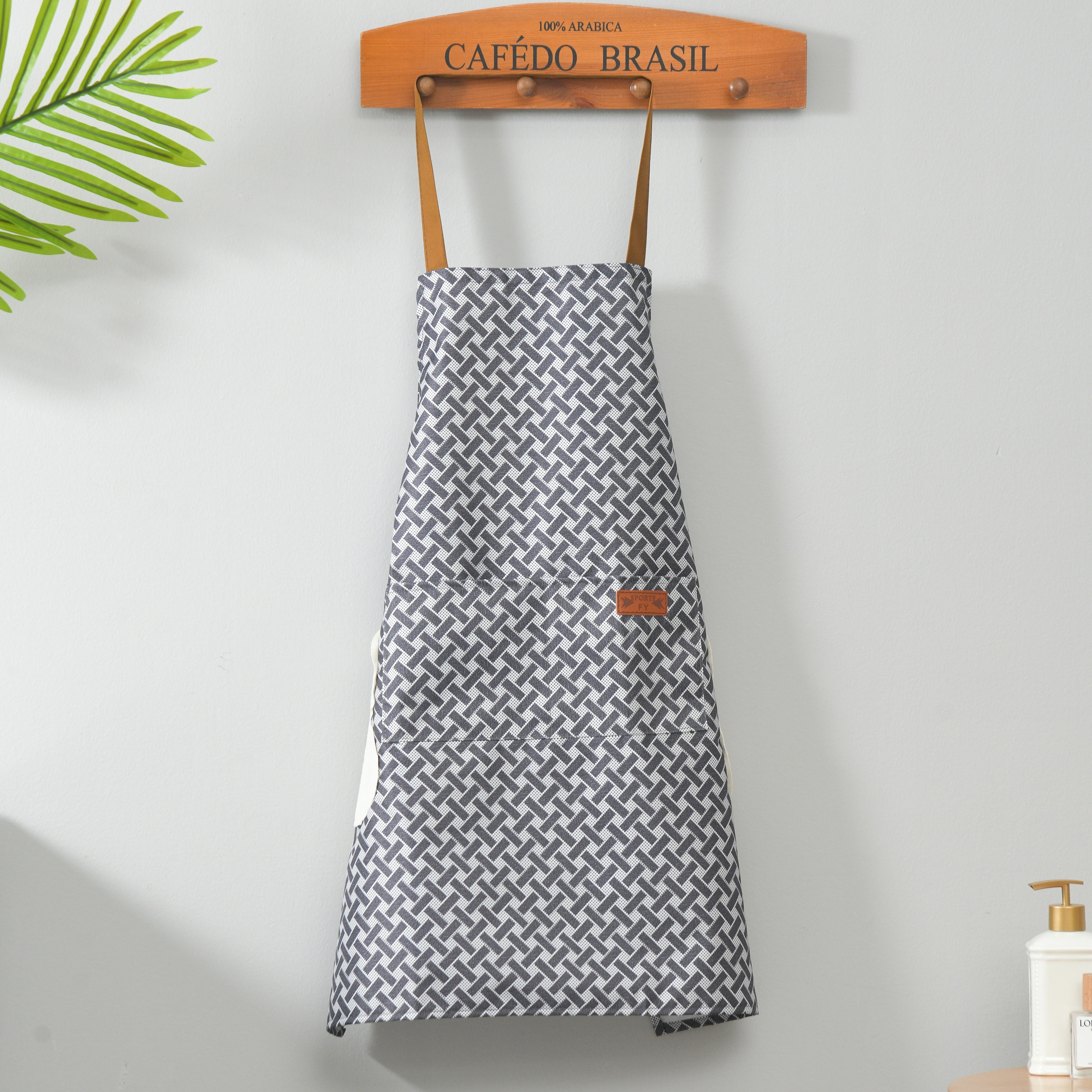 The household apron is oil-resistant and washable. The large apron is a durable kitchen utensware and a must-have for housewives Item Picture
