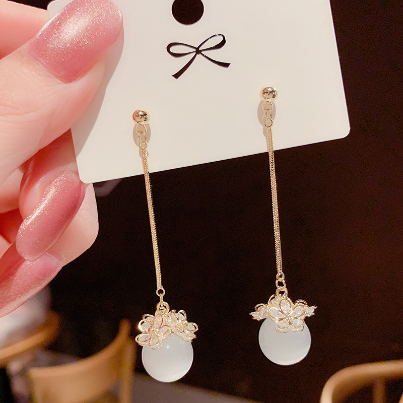 2026 Dongdaemun cat's Eye Stone Long Earrings for women, simple and versatile, face-slimming earrings s925 silver needle earrings Application Scenario