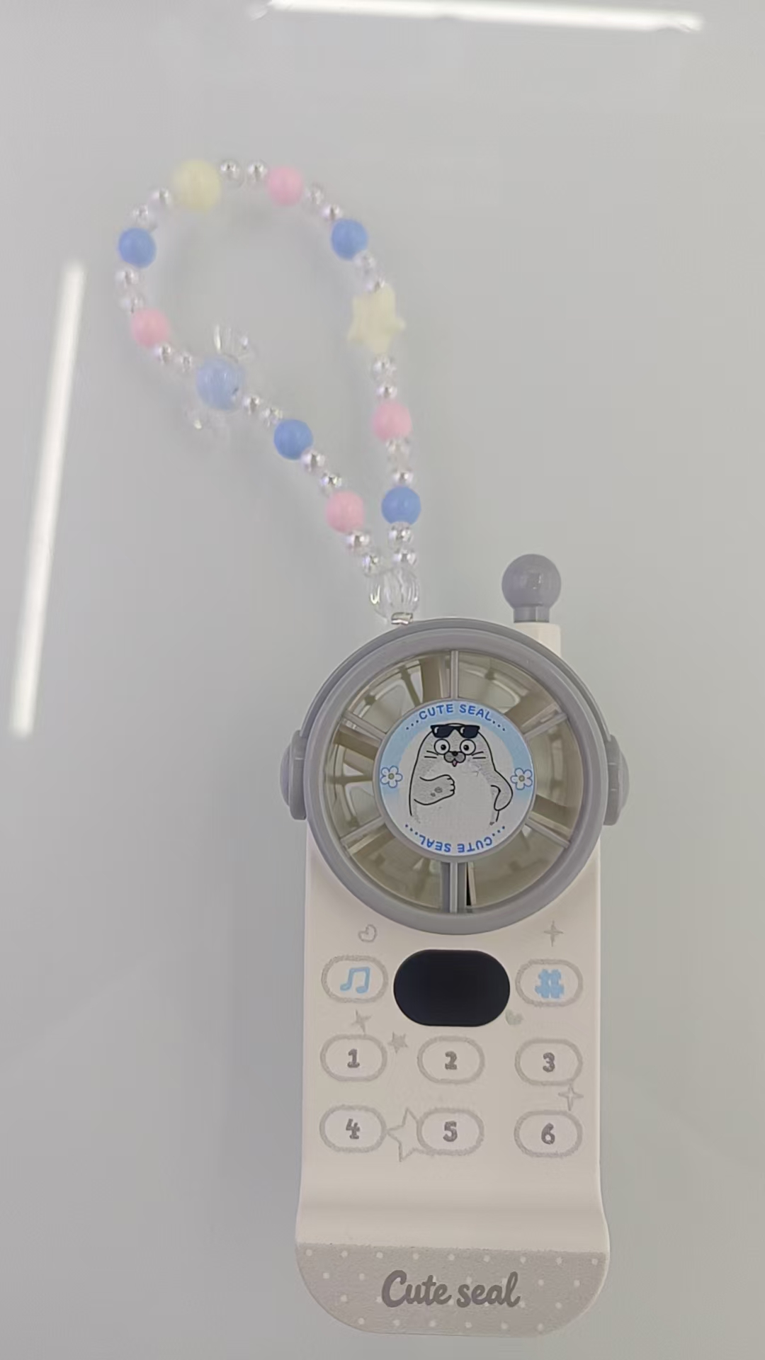 YASE Children's Cartoon Mini Mobile phone, three-color seal penguin cat, 125mm, 56.5mm, 44.5mm lanyard toy Application Scenario