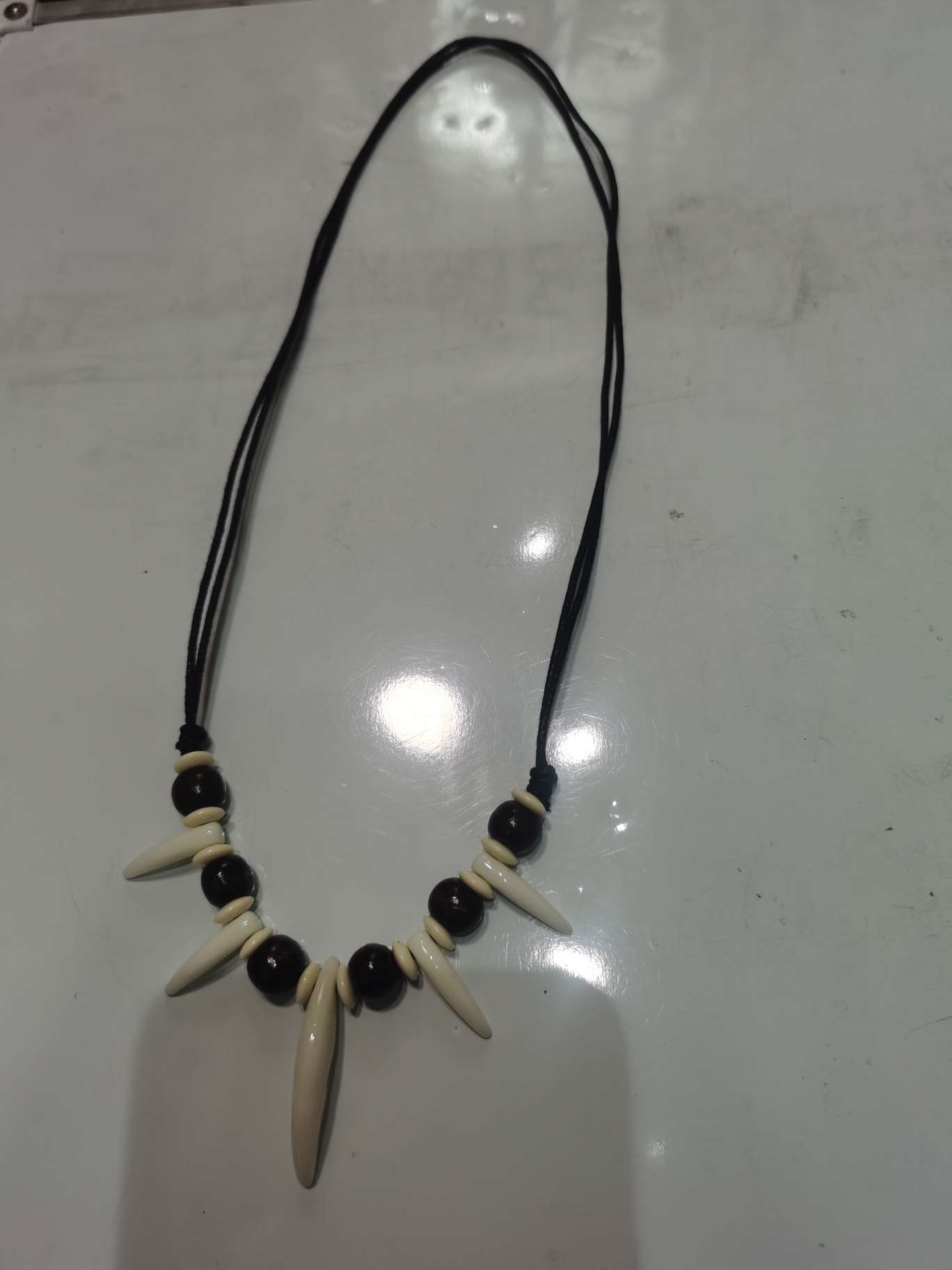 蜡线咖木珠白狗牙项链