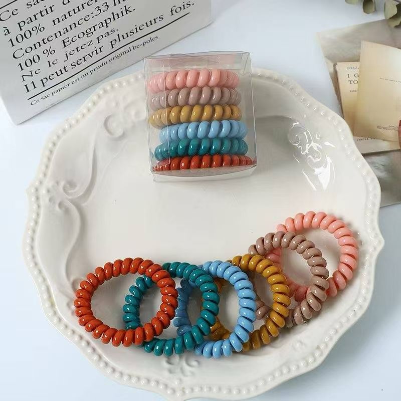 The color of the telephone line coil is mixed. It comes in a box of 6 pieces and is of good quality details Picture