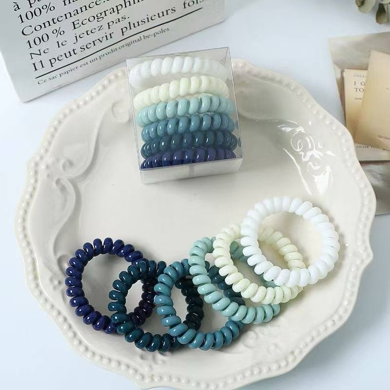The color of the telephone line coil is mixed. It comes in a box of 6 pieces and is of good quality Specification image