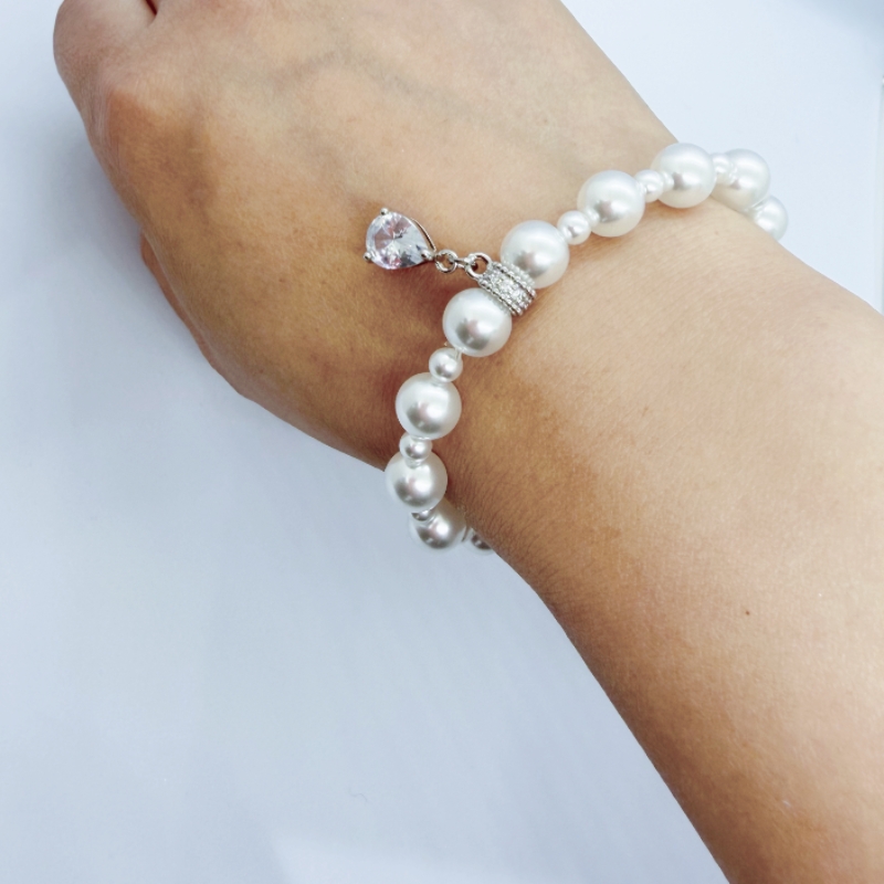 The new Pearl 2026 bracelet, a high-end elastic fine-layered jewelry and bracelet for women, is a bestseller Item Picture