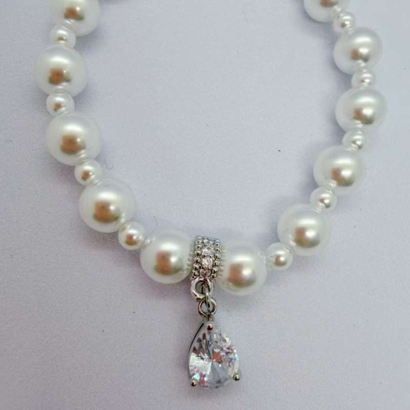 The new Pearl 2026 bracelet, a high-end elastic fine-layered jewelry and bracelet for women, is a bestseller details Picture
