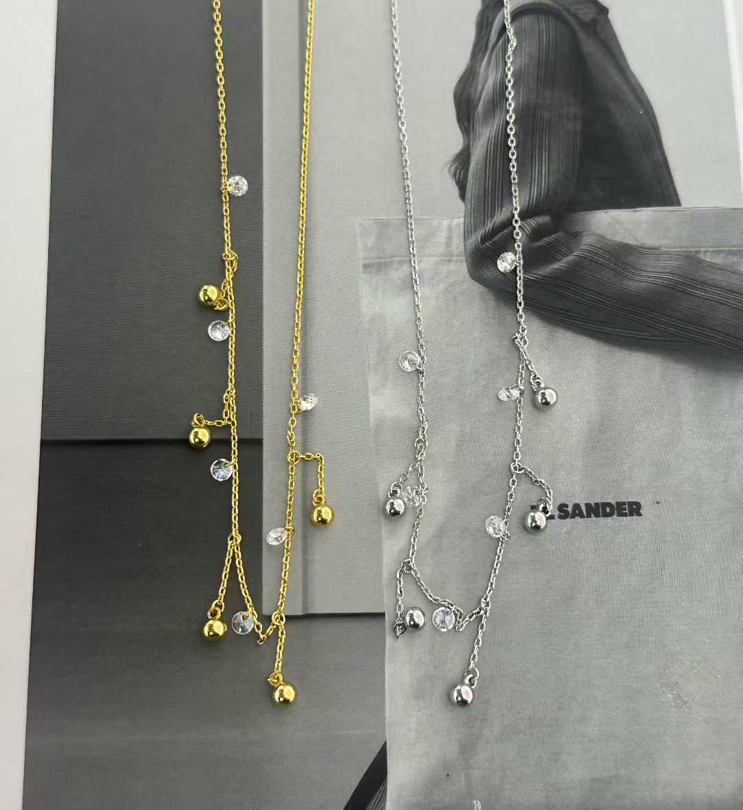 A niche white zirconium tassel necklace for women with a collarbone chain that doesn't fade Application Scenario