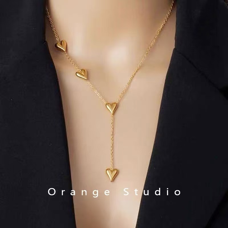 Titanium steel snake bone chain collarbone chain, niche light luxury Horse Year pendant heart-shaped necklace, fashionable collarbone chain V-shaped necklace, neck accessory collarbone chain, niche light luxury snake bone chain, chain collarbone chain Application Scenario