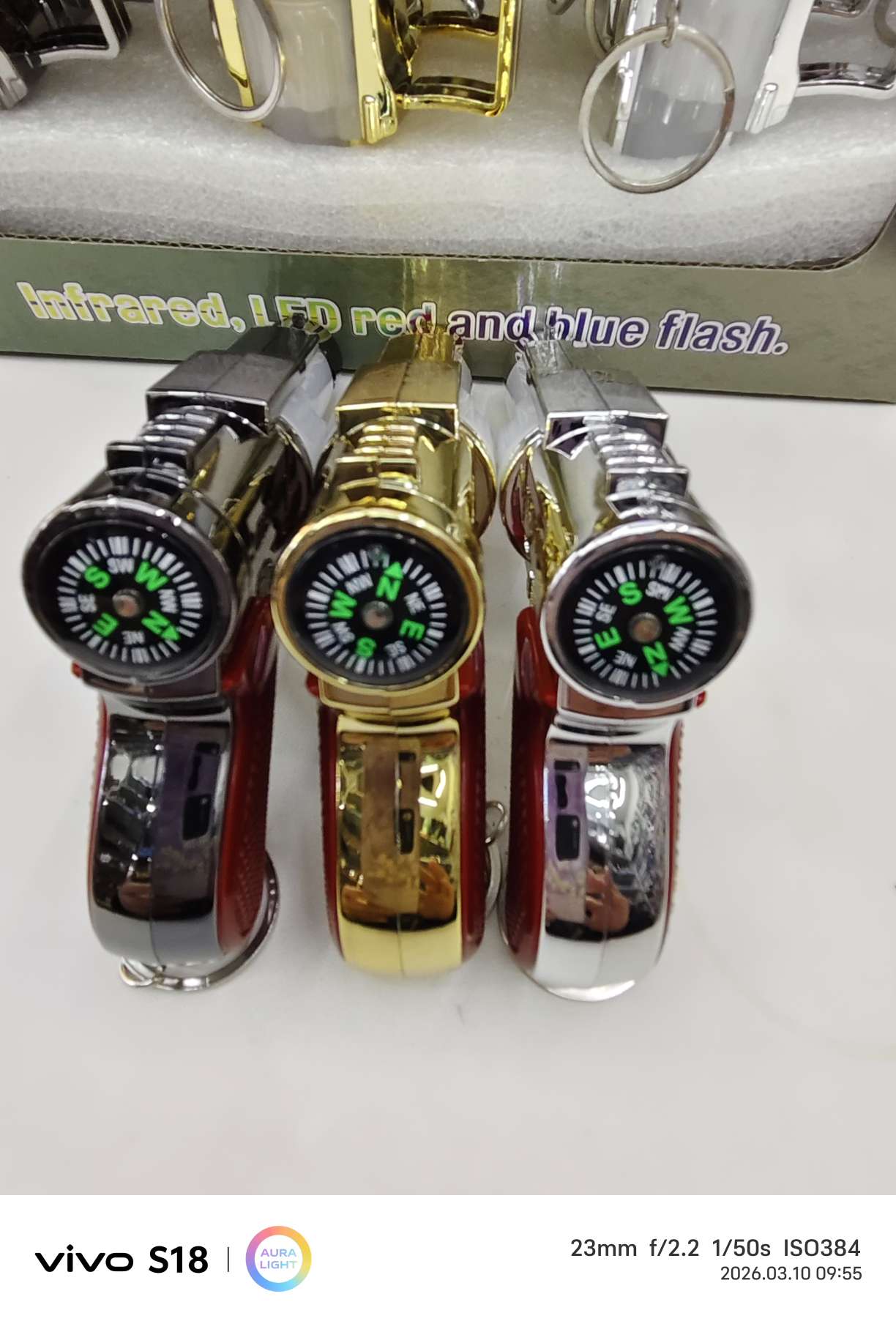 新型迷你手仓指南针激光照明快闪灯多功能学生玩具手电筒产品图