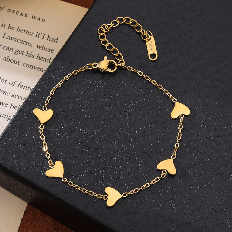 Red string copper slightly inlaid four-leaf clover bracelet for women, irregular versatile jewelry Specification image