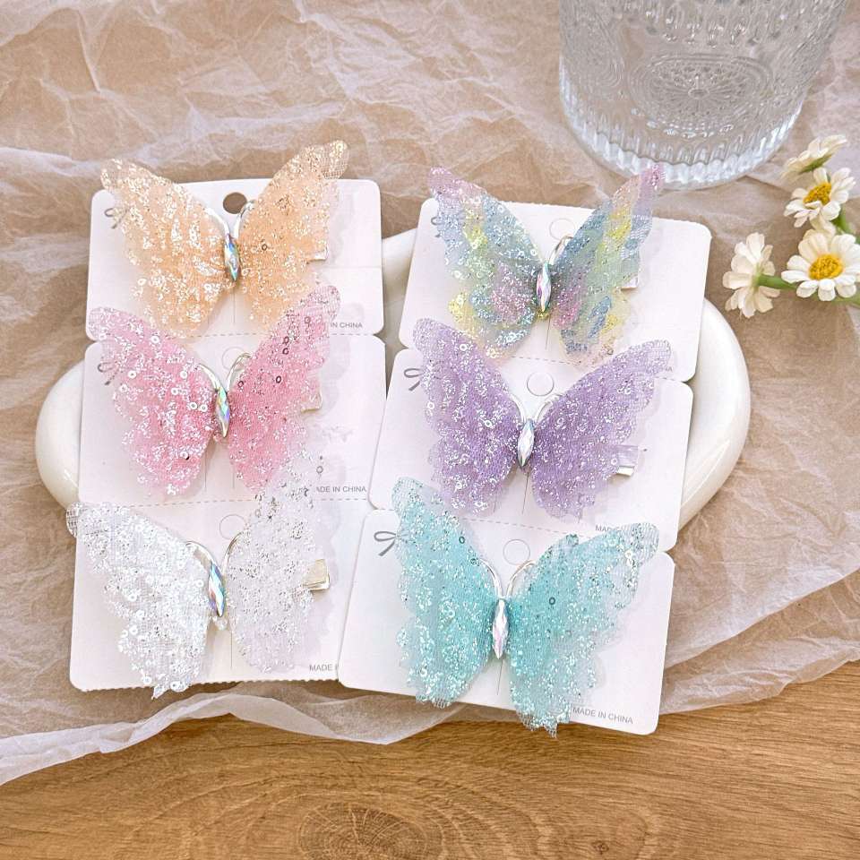 Super fairy fine glittering three-dimensional butterfly hairpin, multi-layer mesh glittering diamond design, cute princess, children's and girlish hairpin, children's hairpin Application Scenario