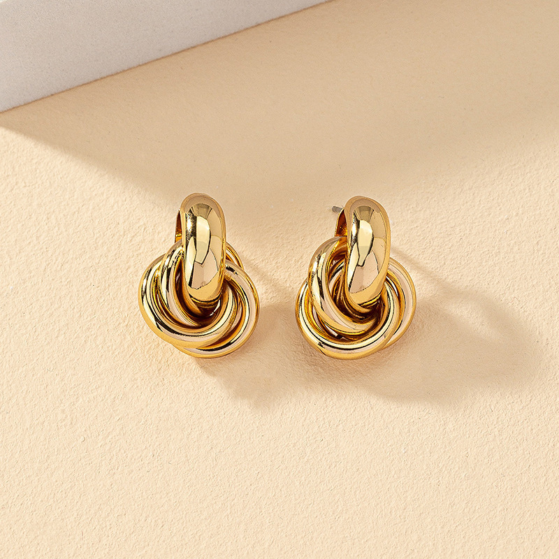 Cross-border European and American style golden circle geometric twisted multi-layer twist earrings, niche design sense, fashionable and versatile earrings