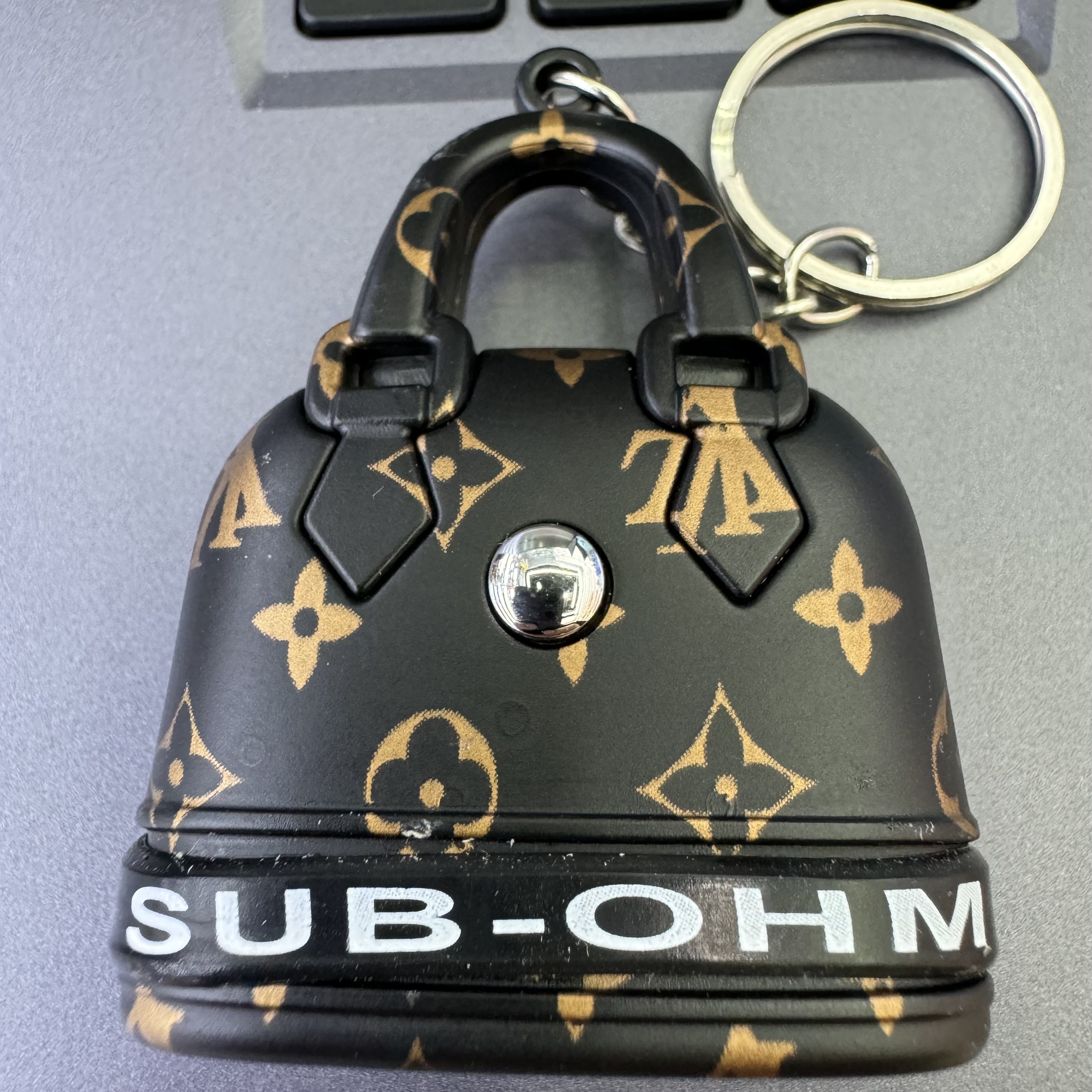 Mini handbag, multi-functional creative keychain, pendant, laser light, flashlight, convenient to carry, factory wholesale 130 Specification image
