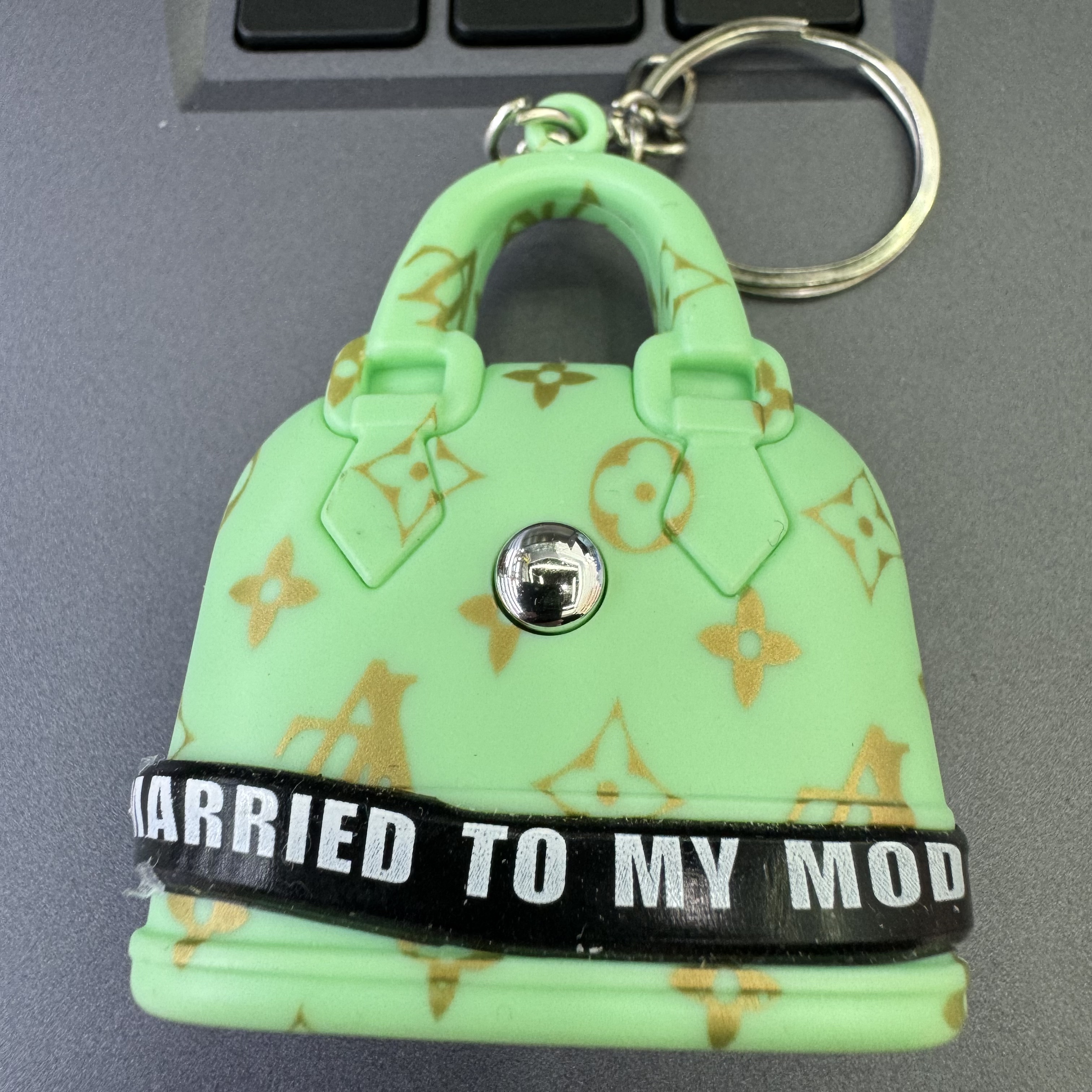 Mini handbag, multi-functional creative keychain, pendant, laser light, flashlight, convenient to carry, factory wholesale 130 details Picture