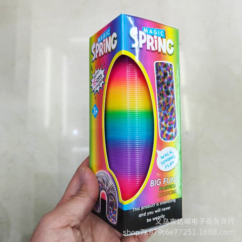 Large rainbow ring magic plastic folding ring Spring ring toy luminous elastic pull ring Rainbow ring children's game detail image 4