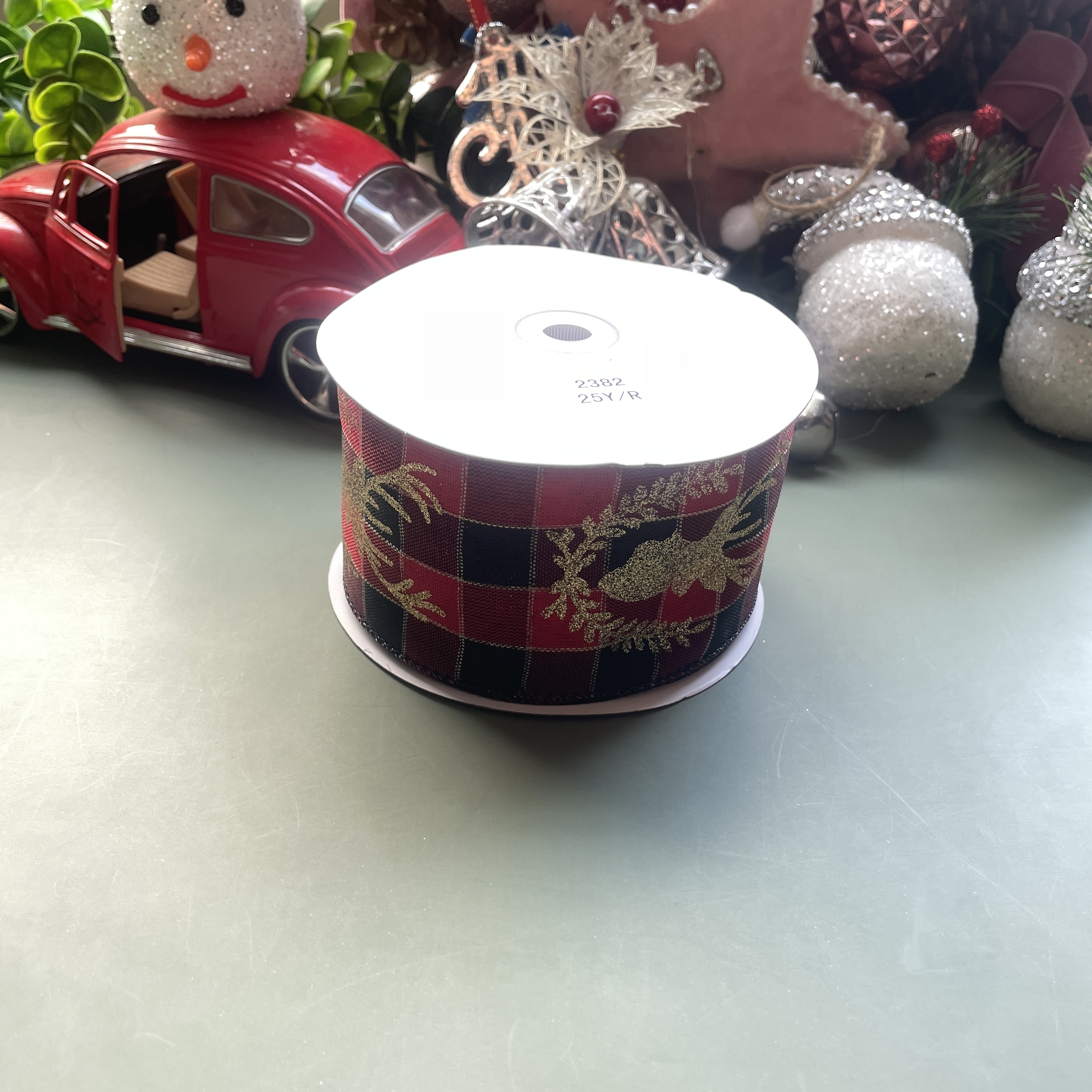 Item No. : 2382 Christmas Gift Packaging Decoration DIY Checkered Cloth Double-stripe Printed Gold Onion Deer Head Christmas Iron Wire Tape 6.3cm Application Scenario