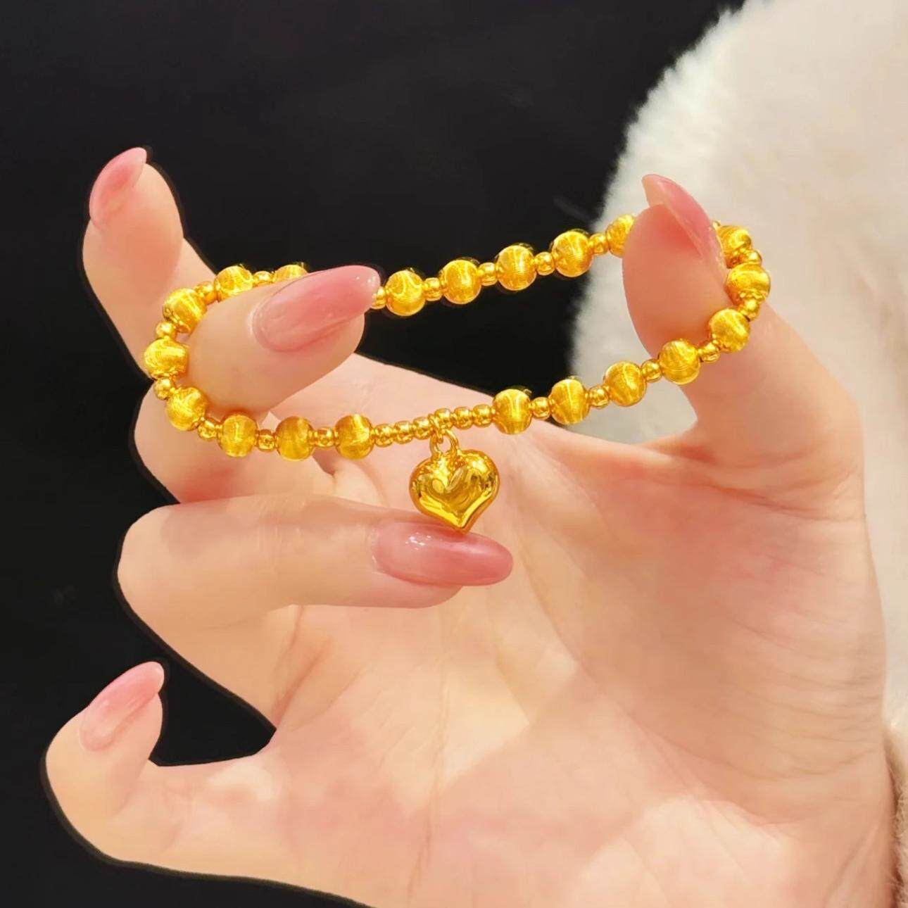 Ancient-style golden sparkling cat eye heart-shaped bracelet for women, a high-end and light luxury round bead bracelet for your girlfriend