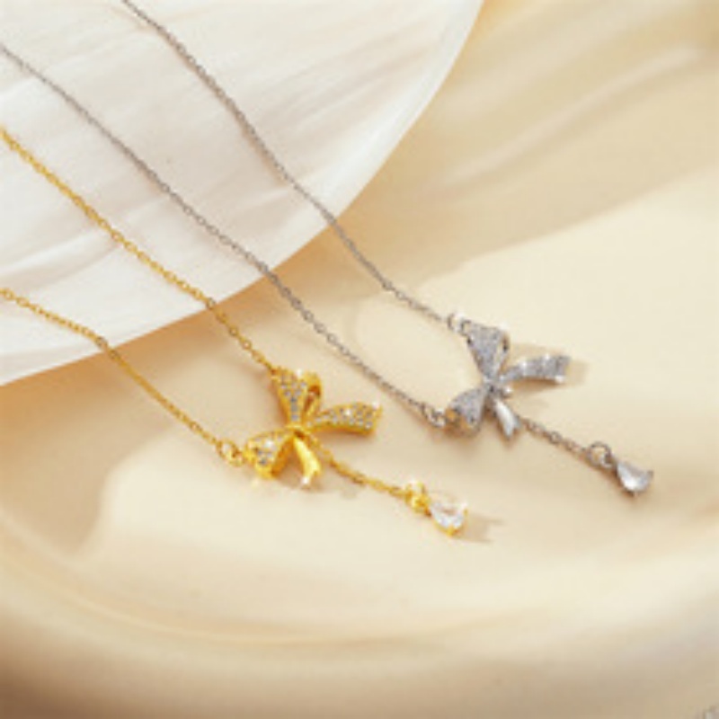 钛钢项链女范琦同款蝴蝶结流苏吊坠配饰气质轻奢时尚百搭女锁骨链