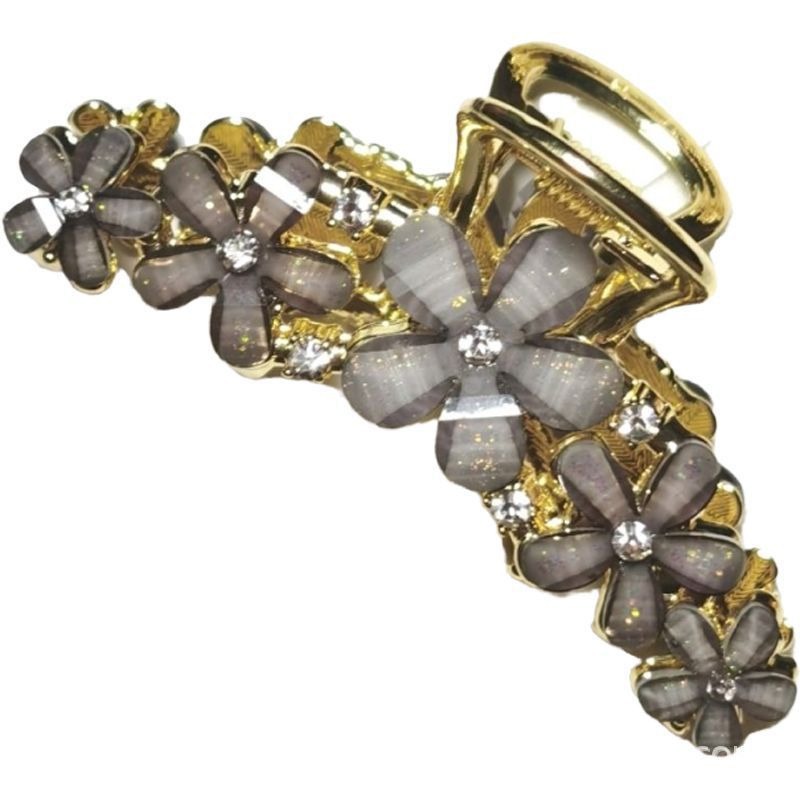 Korean-style fresh Daisy crystal hairpin at the back of the head to show hair volume, shark hairpin in fairy style, fashionable and elegant alloy hairpin Item Picture