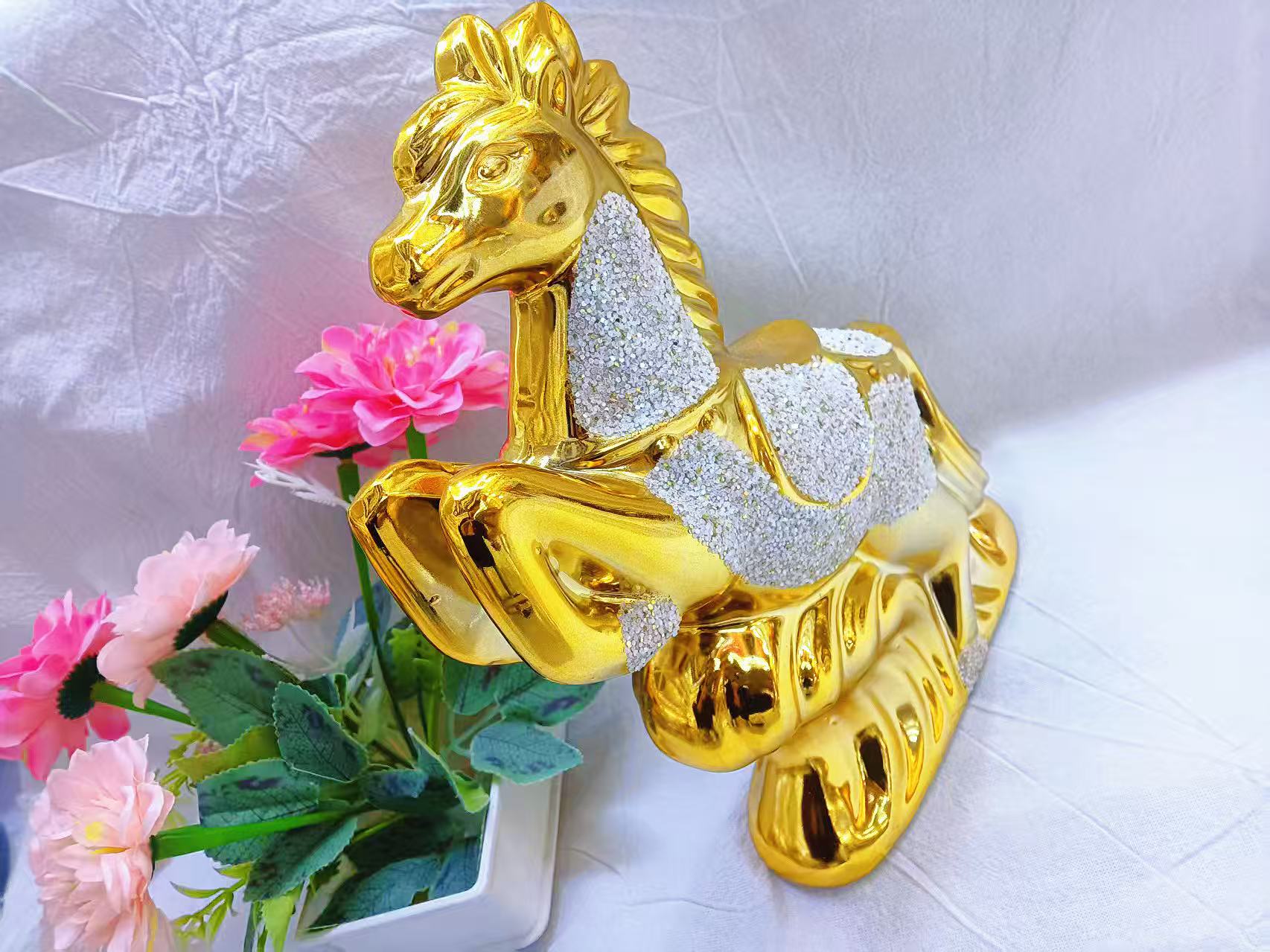 The living room wine cabinet is decorated with exquisite golden animal ornaments and a light luxury style golden horse ornaments Application Scenario