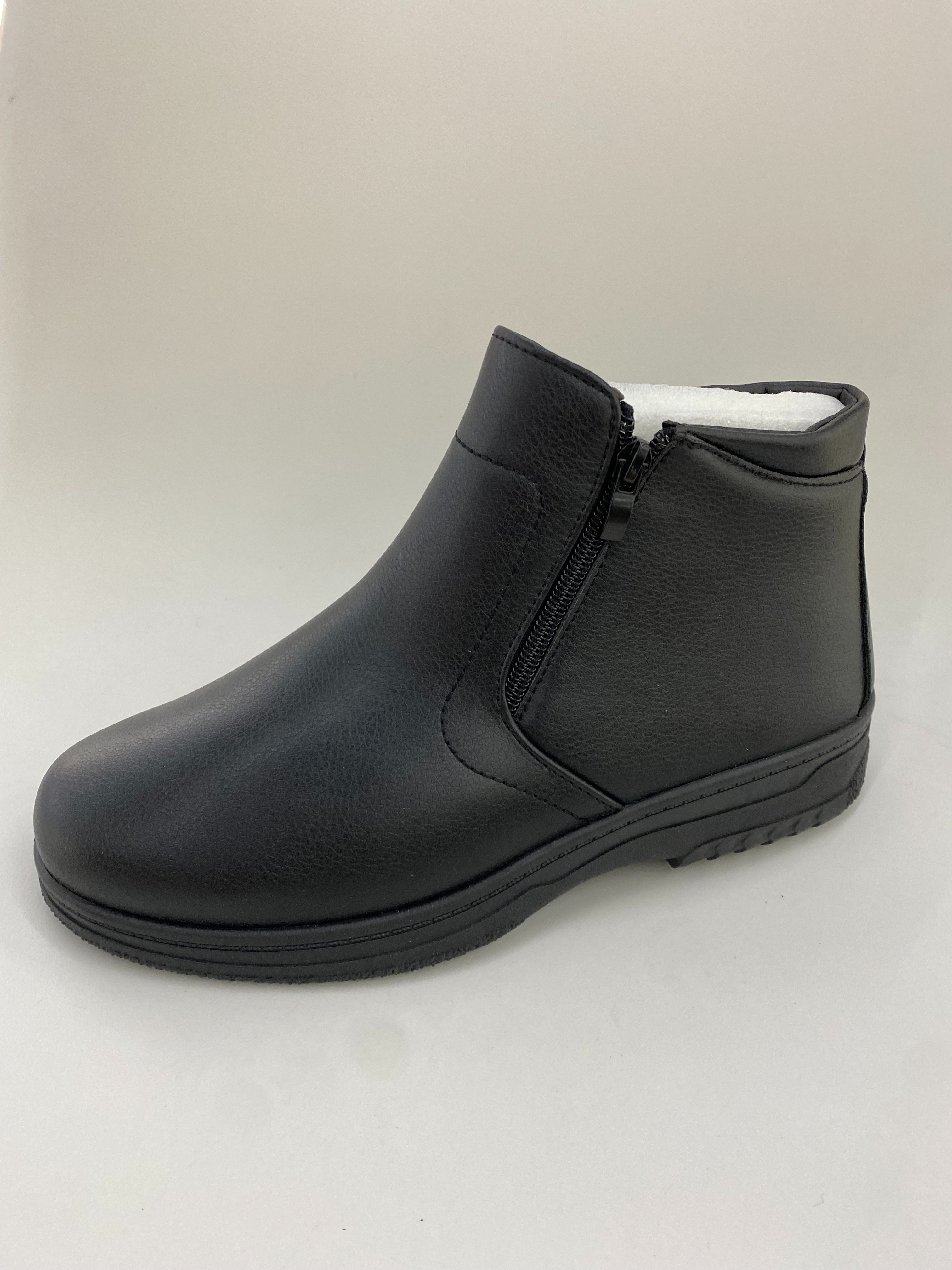 The black ankle boots and half boots have a simple and versatile design full figure