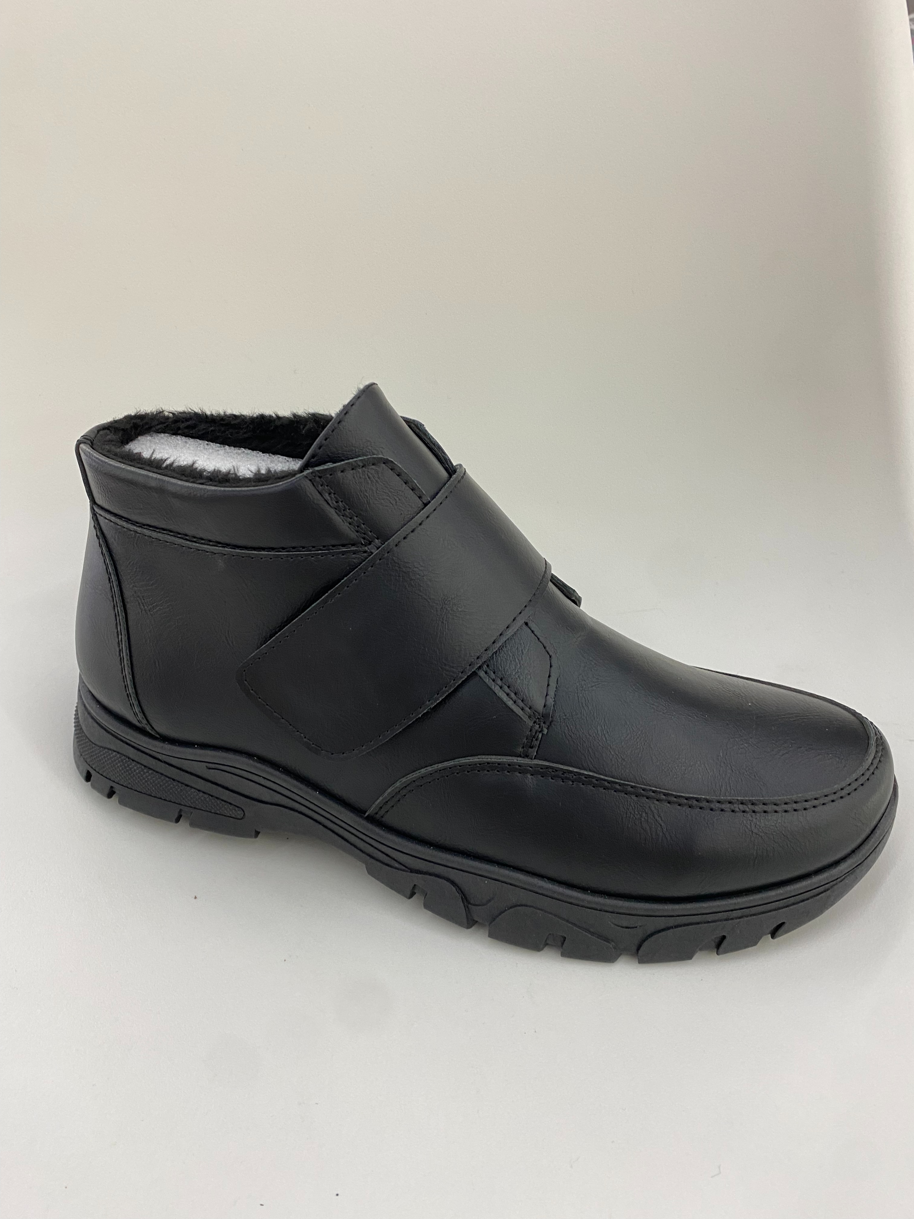 Black leather ankle boots, half boots and leather boots full figure