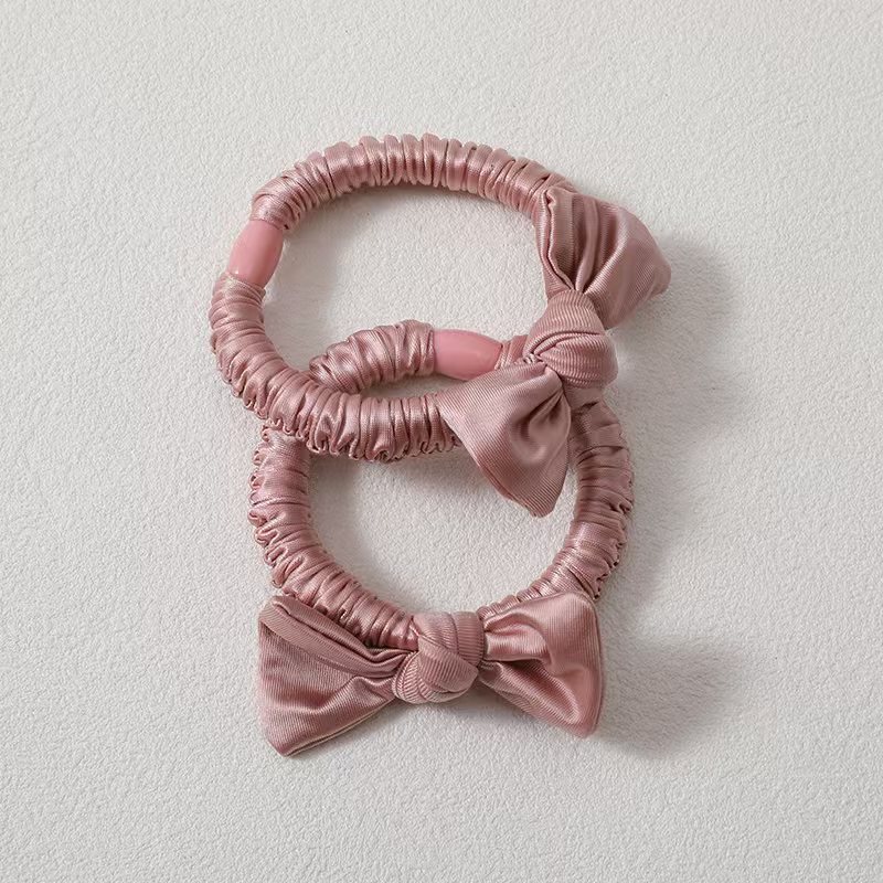 The new style of hair tie in 2024 features a simple pearl-like hair band, a large intestine band, and a high-elasticity thick leather band for women to tie their hair detail image 14