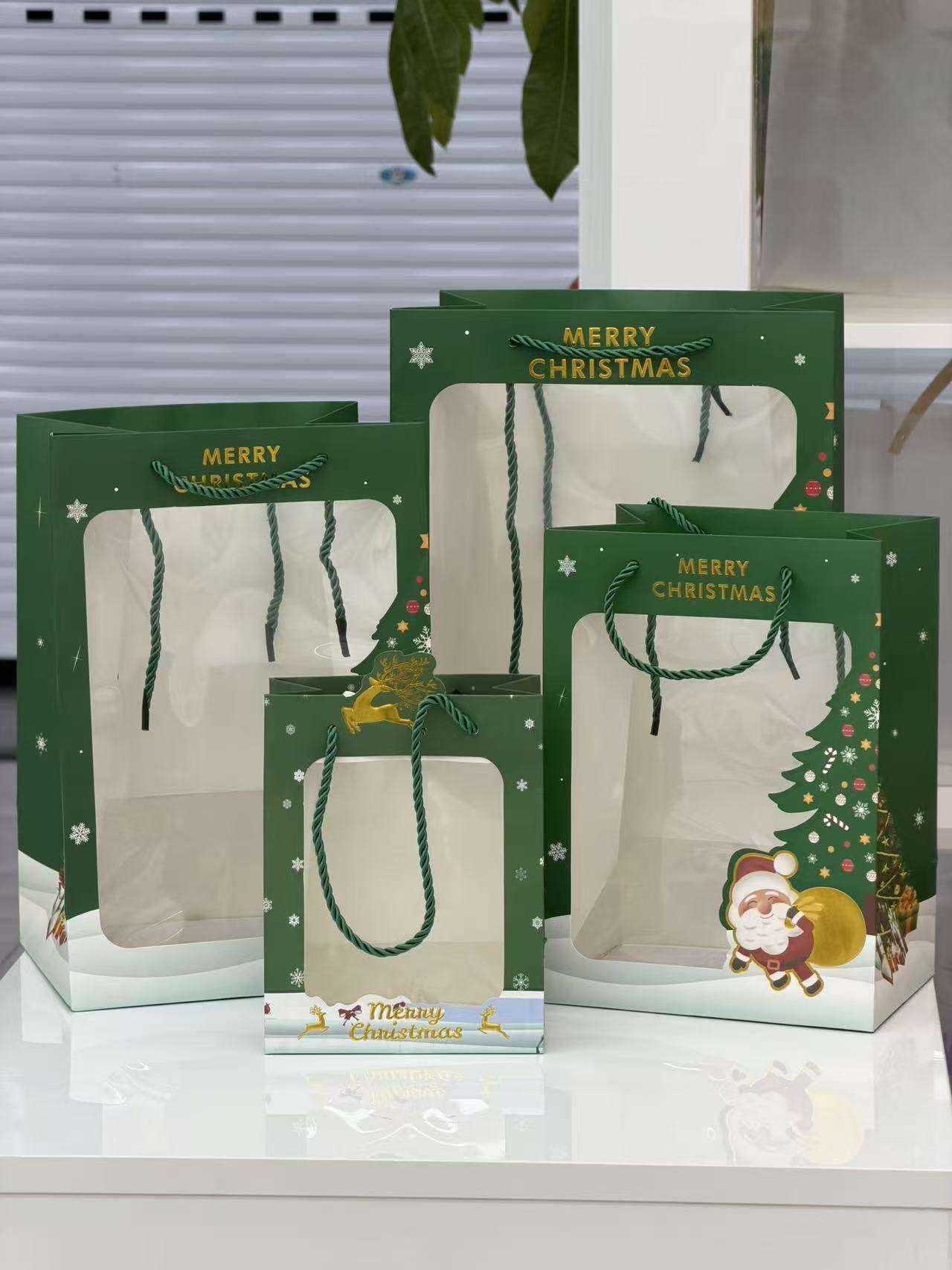 圣诞系列礼品透明袋特小号14*8*18，小号18*13*25，中号20*16*30，大号25*18*35详情5