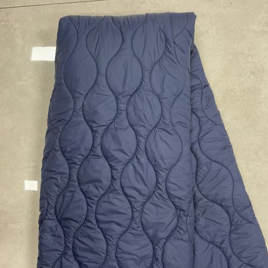 Quilted fabric in warm dark blue