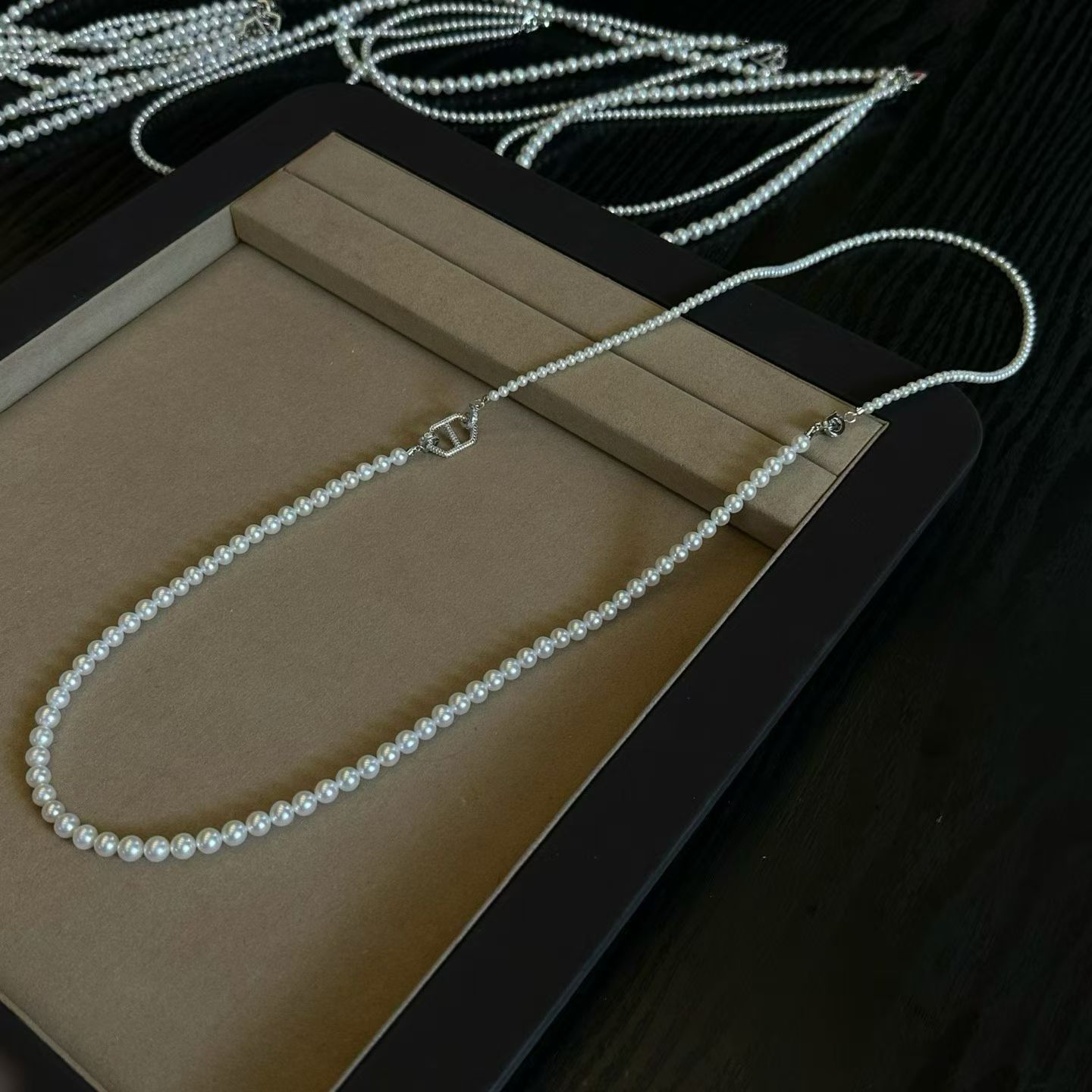 Four ways to wear natural freshwater pearls with a silver clasp details Picture