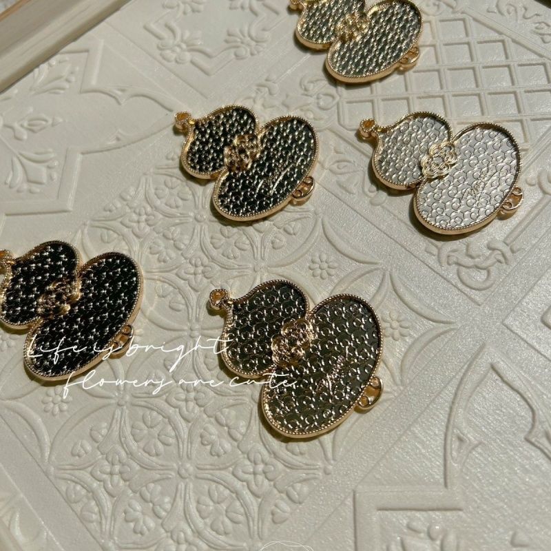 Wholesale of intangible cultural heritage Song Brocade alloy base body pendants. Wholesale of intangible cultural Heritage Song Brocade alloy base body pendants