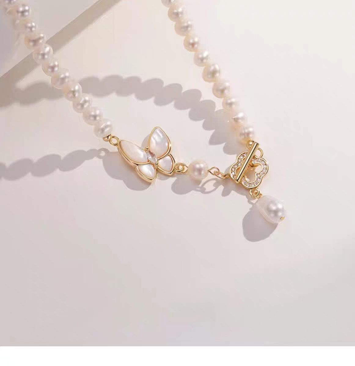 天然石珍珠项链女款蝴蝶吊坠拼接气质珍珠链条