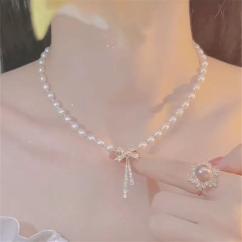 天然珍珠项链女款设计款颈链条女款蝴蝶结项链复古锁骨链