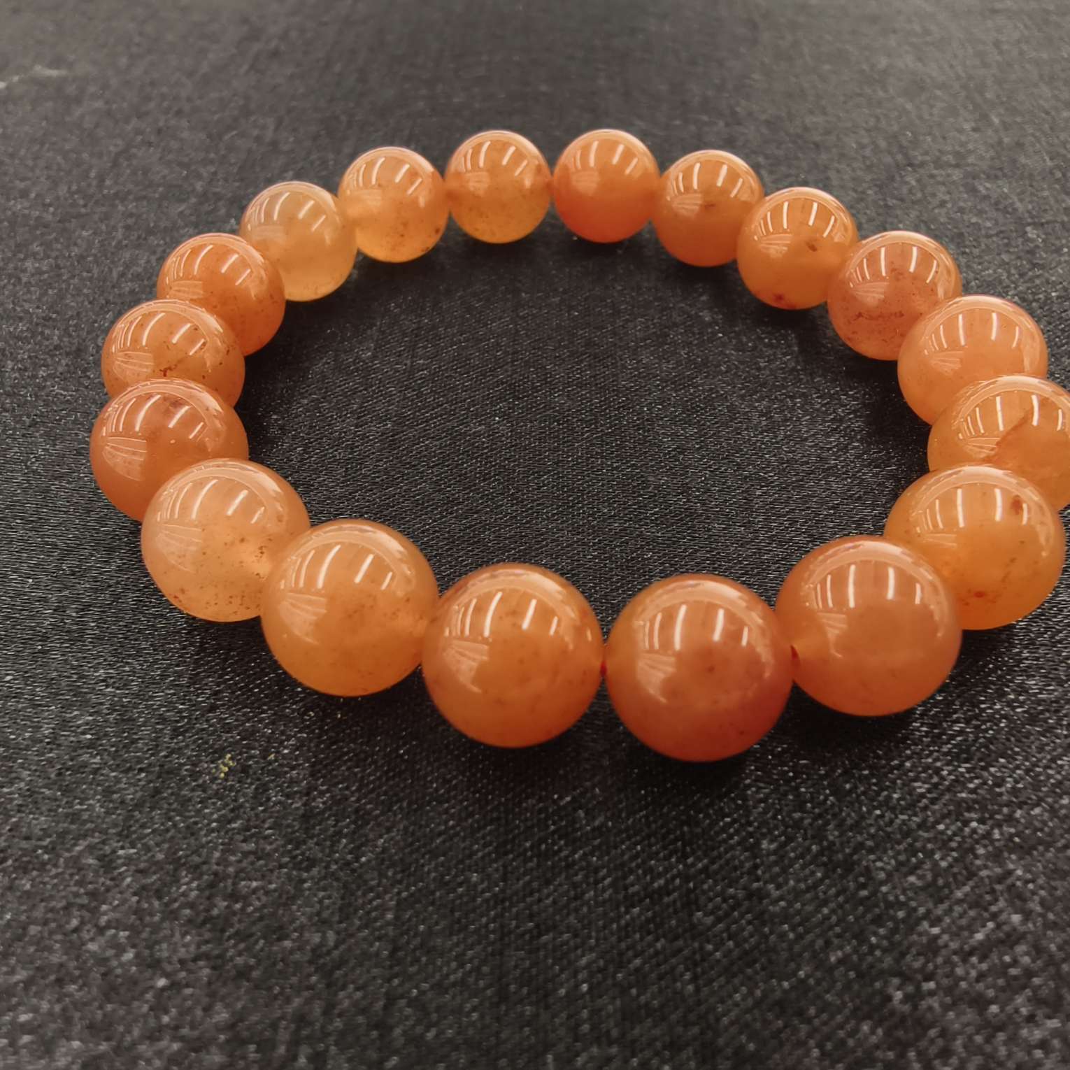 天然原矿南红手串，无胶无裂无优化。天然纹理，每一串都是孤品。珠宝首饰珠宝玄学细节图