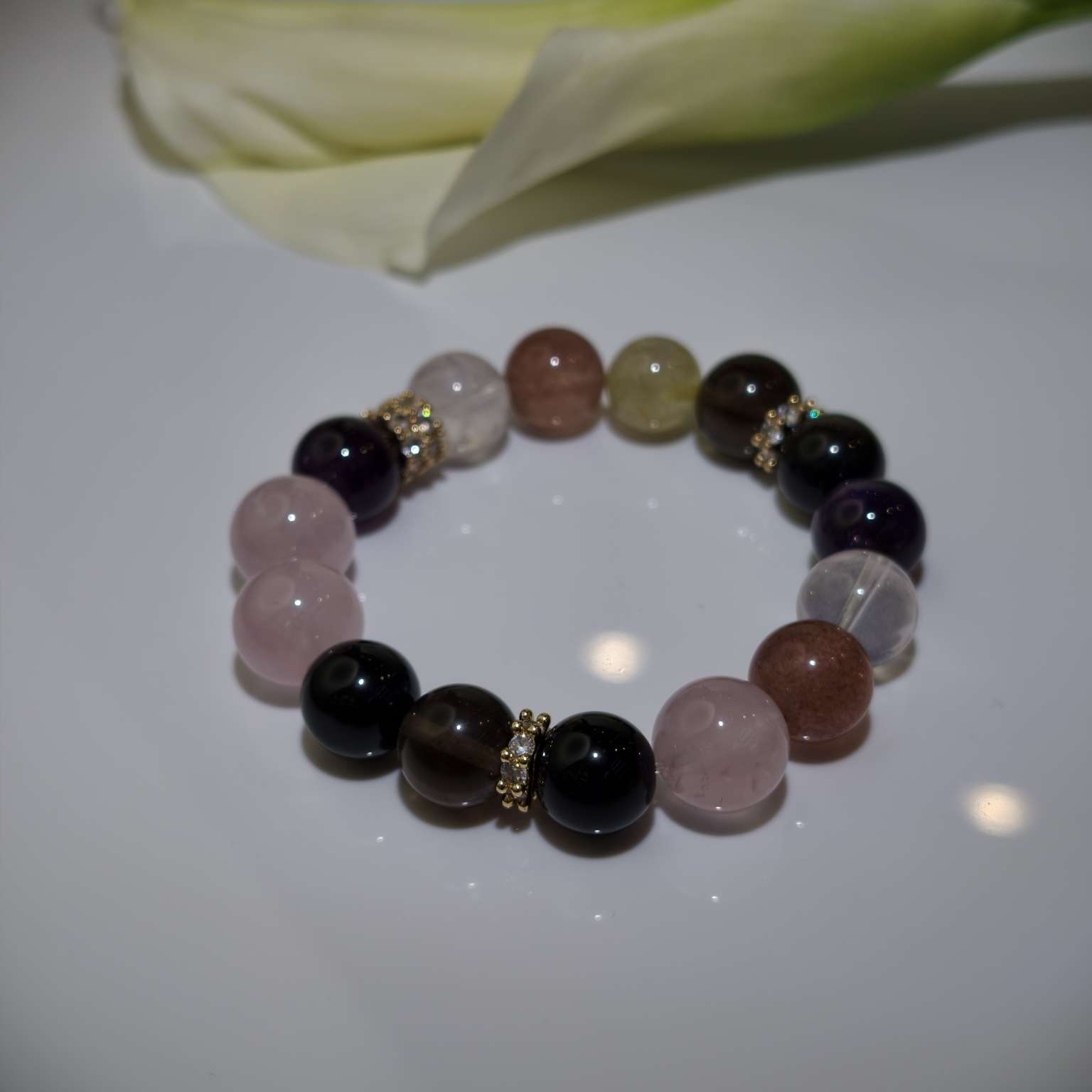 金发钛晶草莓晶白阿塞乌拉圭紫水晶马粉冰曜石黑曜石十二生肖开运手串戌狗专属水晶手串产品图