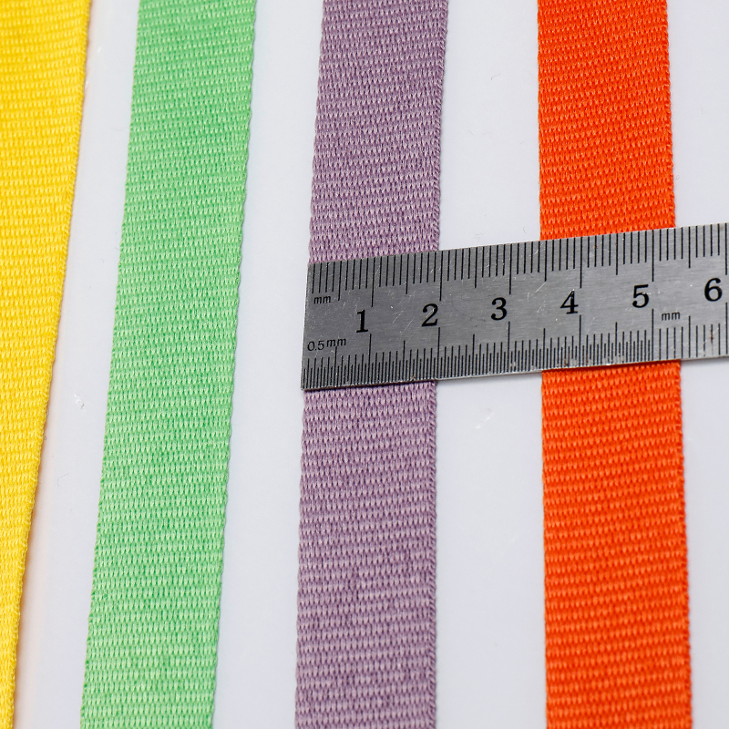 Factory direct supply of imitation nylon webbing, black and white colored sliding tape, 1.0cm, 1.2cm, 1.5cm, 2.0cm. Clothing, shoes, bags and decorative accessories in stock available for delivery Application Scenario