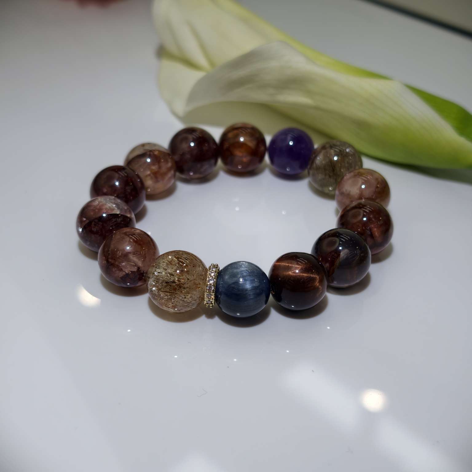 黑金超七乌拉圭紫水晶牛血黑胶花蓝晶石水晶手串细节图