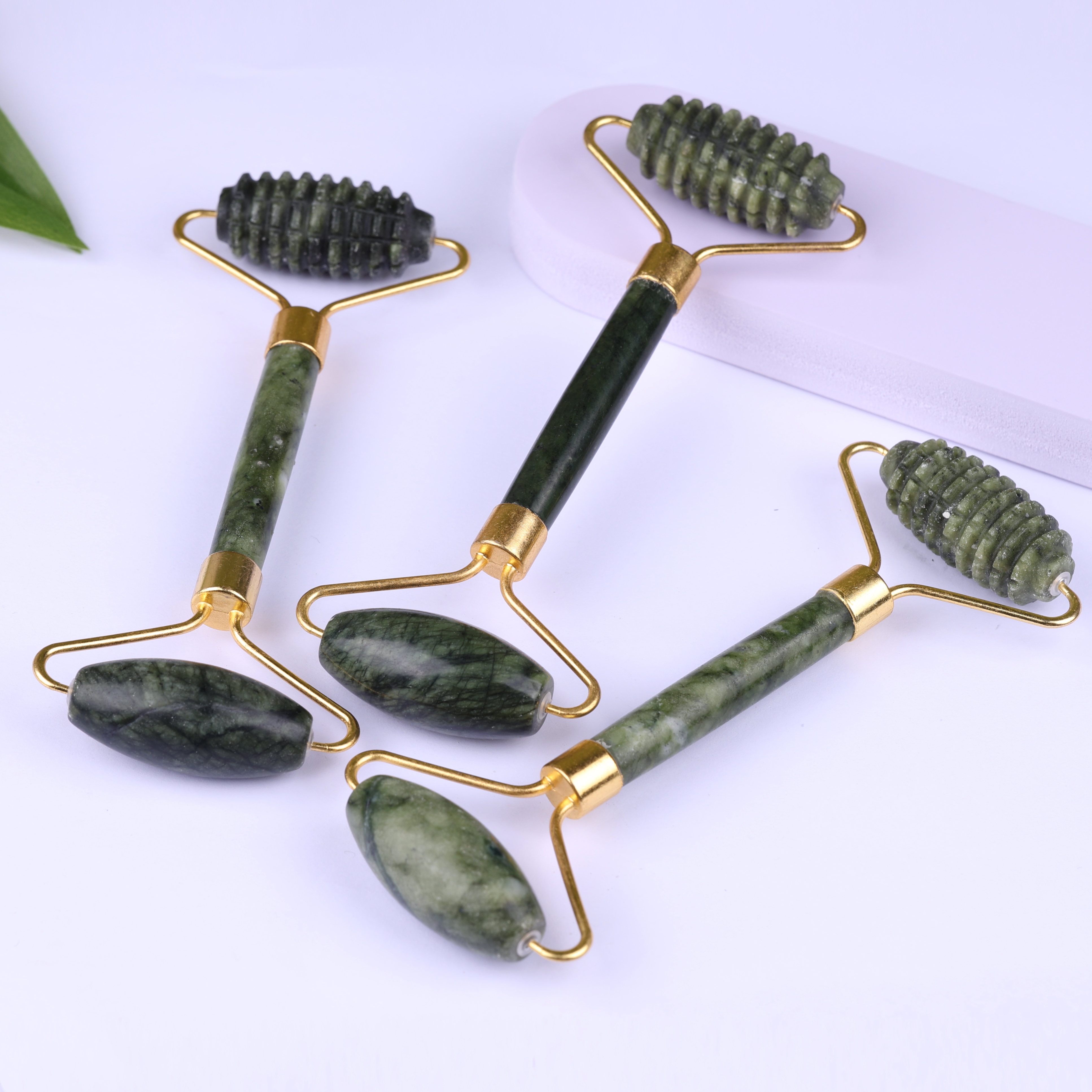 Jade brim zinc alloy frame roller massager meridian beauty facial container massage tool details Picture