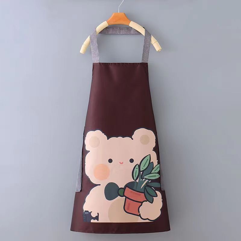 A fresh and fashionable cartoon bear apron for home kitchen, waterproof and oil-proof, cute for cooking, can be used to wipe hands, and worn around the neck and waist Application Scenario