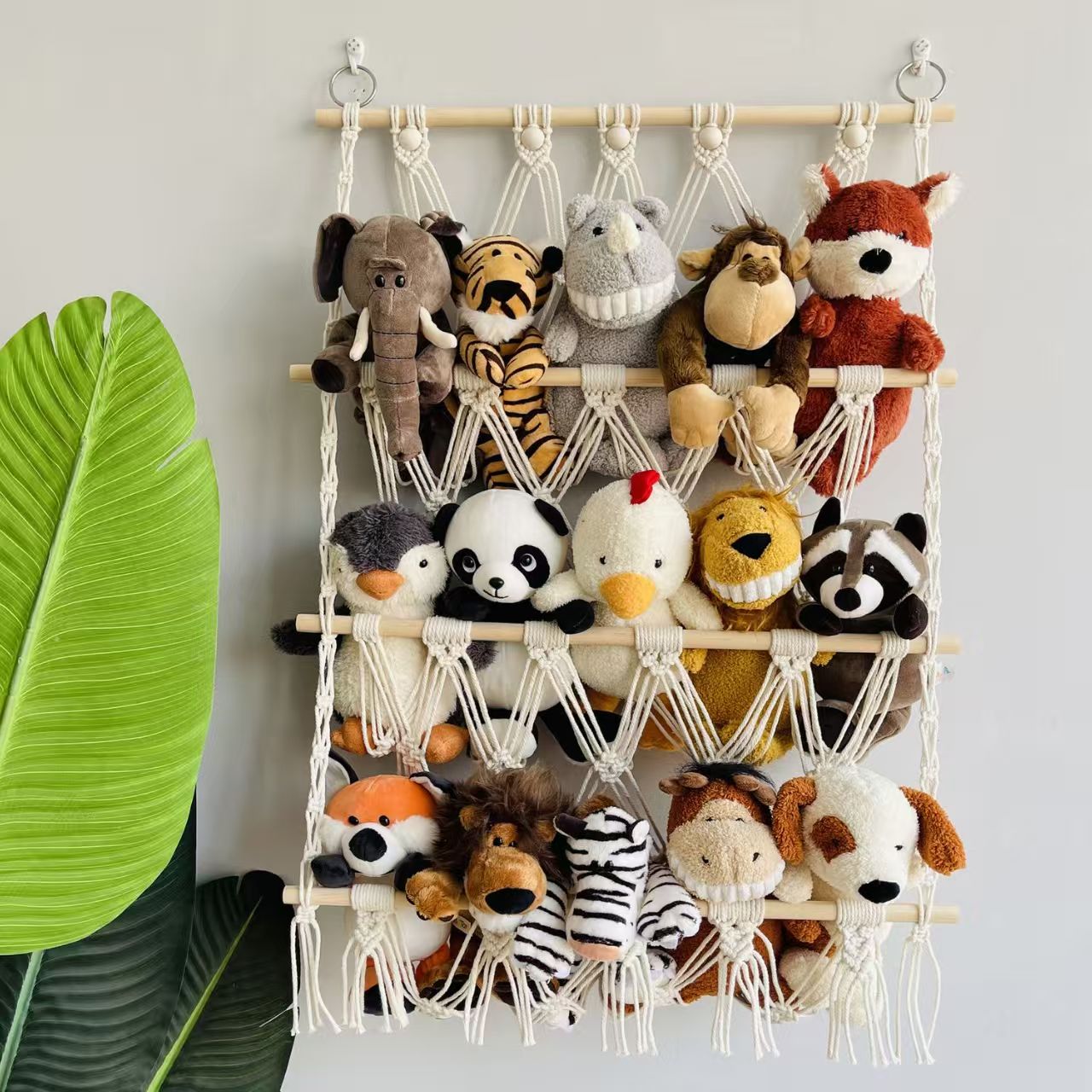 This Norse-style hand-woven multi-layer wall-mounted storage rack with tassel design integrates wall storage and decoration for children's rooms. It is made of cotton rope weaving, enhancing the warm and cozy atmosphere of the home. It is a perfect soft furnishing tool Specification image