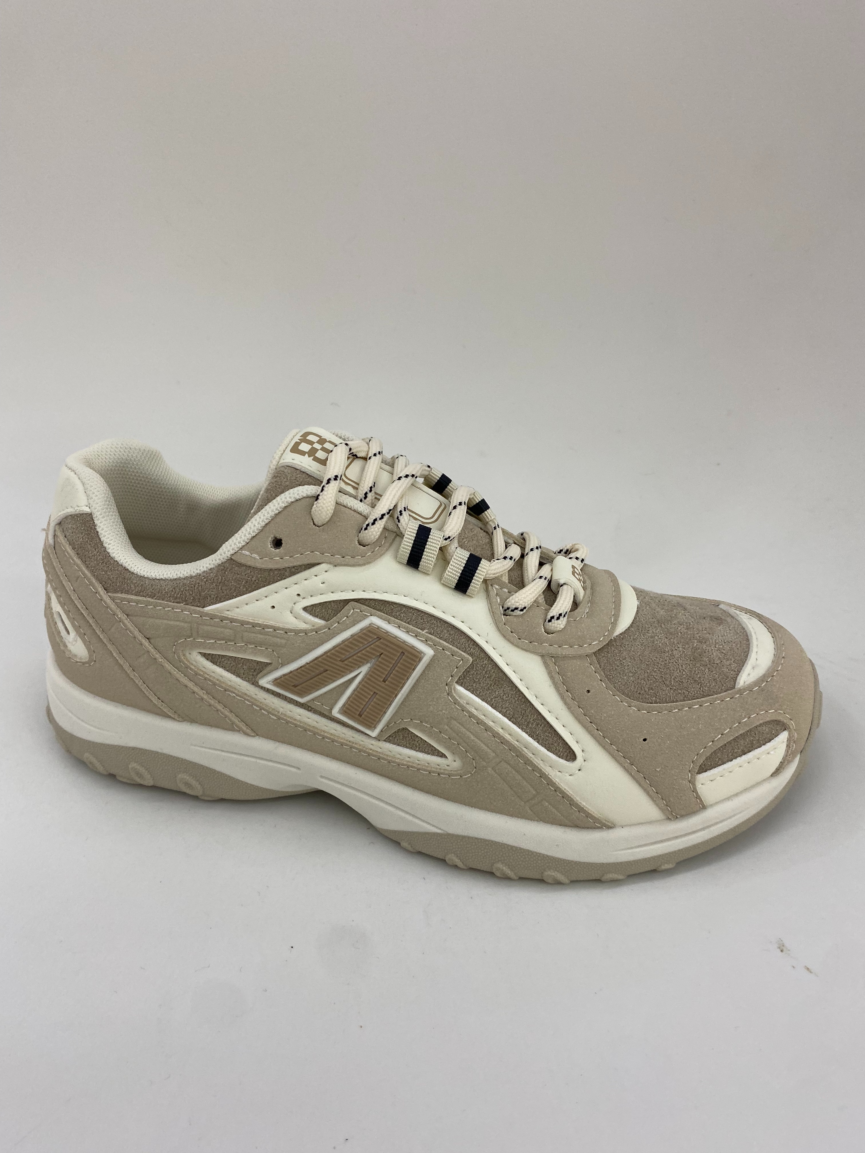 Brown and white striped sports shoes for women are comfortable and durable full figure