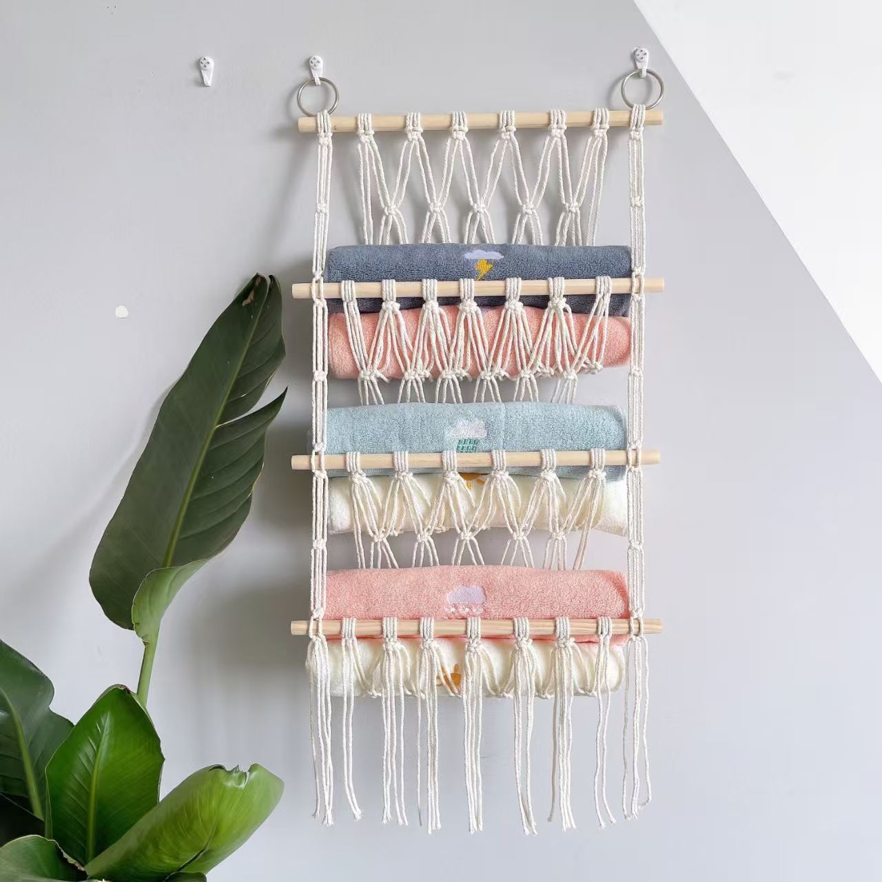 Nordic-style hand-woven storage tapestry, made of natural wood poles and cotton ropes, integrates wall storage and decoration, enhancing the soft furnishing atmosphere and style of your home details Picture