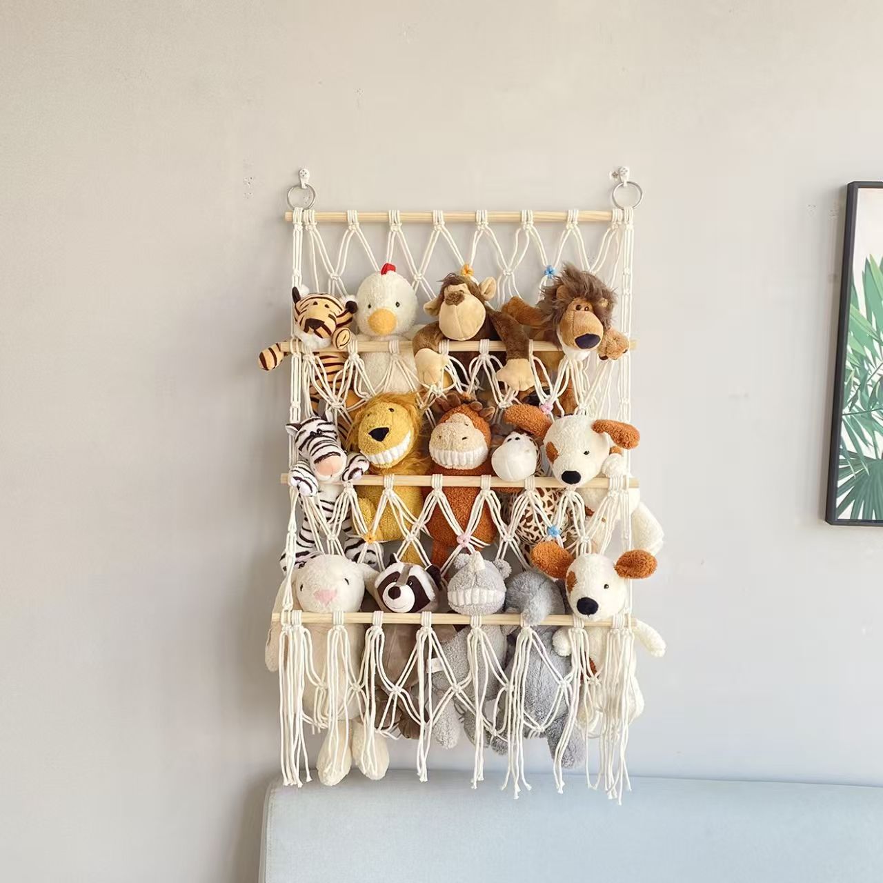 This Norse-style hand-woven multi-layer wall-mounted storage rack with tassel design integrates wall storage and decoration for children's rooms. It is made of cotton rope weaving, enhancing the warm and cozy atmosphere of the home. It is a perfect soft furnishing tool Application Scenario