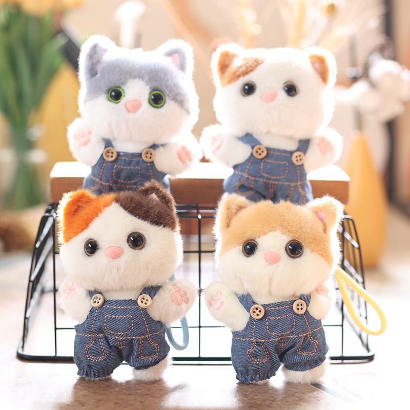 A creative 4-inch plush toy pendant with a little kitten, a claw machine doll, a key pendant, a car schoolbag, a gift, a cartoon transformation keychain, a dress-up doll pendant, and a cute plush toy wholesale