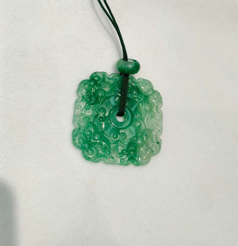 The jade pendant in the misty rain is made of natural jade from Africa, symbolizing wealth from all directions detail image 8