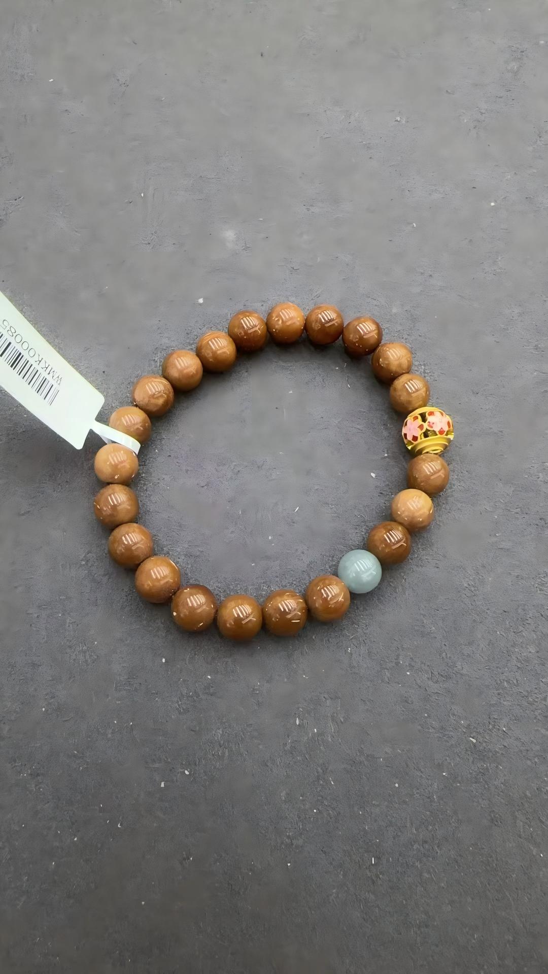 Cook's bracelet features hollowed-out beads details Picture