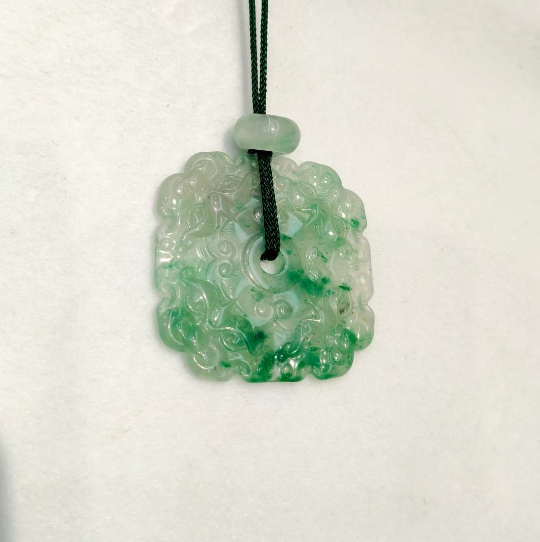 The jade pendant in the misty rain is made of natural jade from Africa, symbolizing wealth from all directions details Picture